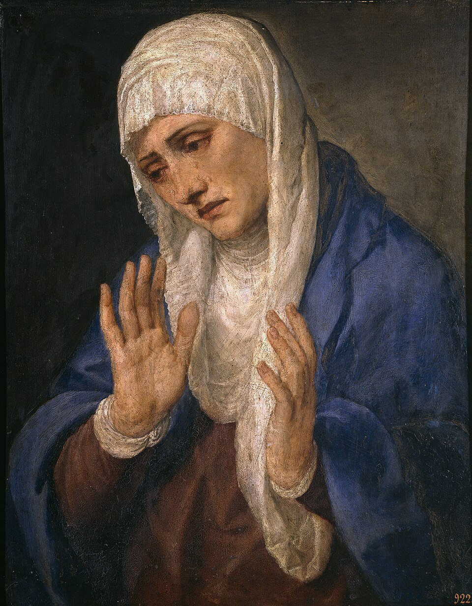 Pintura de la Virgen de los Dolores con toca blanca y manto azul, rostro afligido y manos alzadas