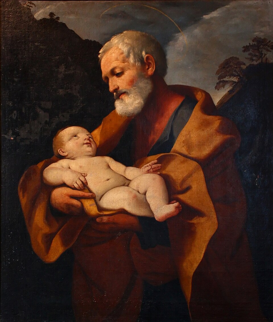 Pintura de san José, anciano de barba blanca y manto ocre, sosteniendo en brazos al Niño Jesús dormido