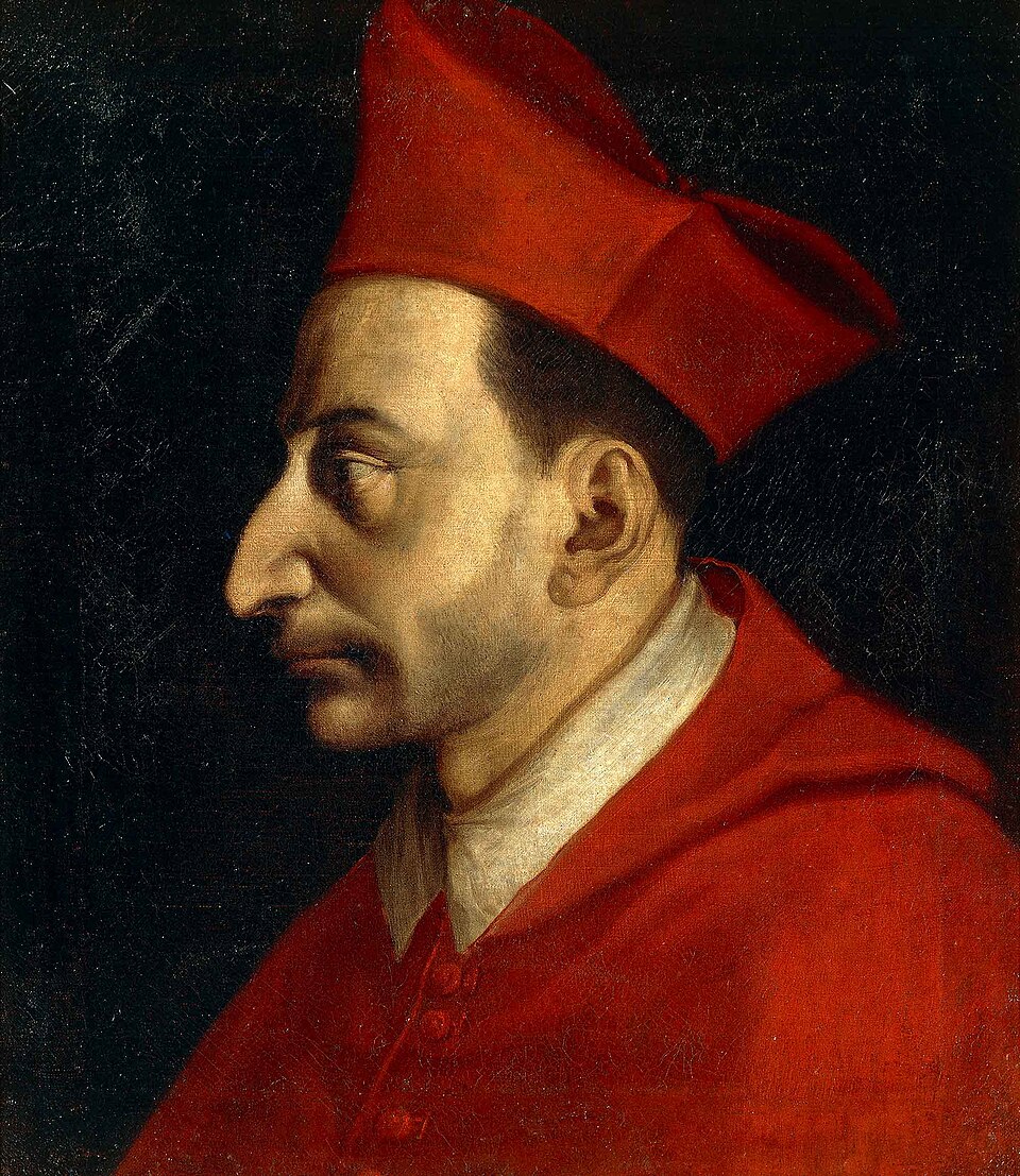 Retrato de perfil de san Carlos Borromeo con birreta y muceta rojas de cardenal sobre fondo oscuro