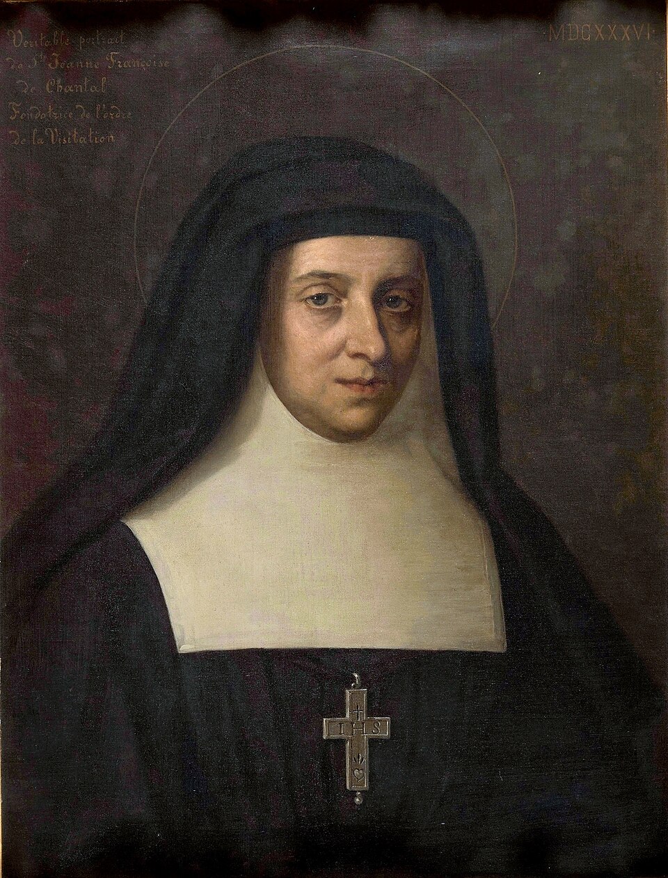 Retrato de santa Juana Francisca de Chantal con hábito negro, toca blanca, aureola y cruz pectoral plateada
