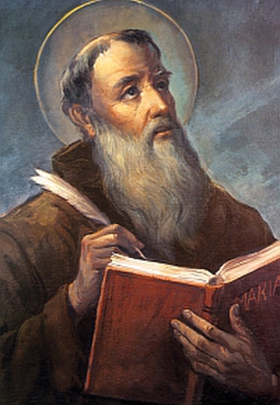 Pintura de san Lorenzo de Brindis con larga barba, hábito capuchino y aureola, escribiendo en un libro con pluma