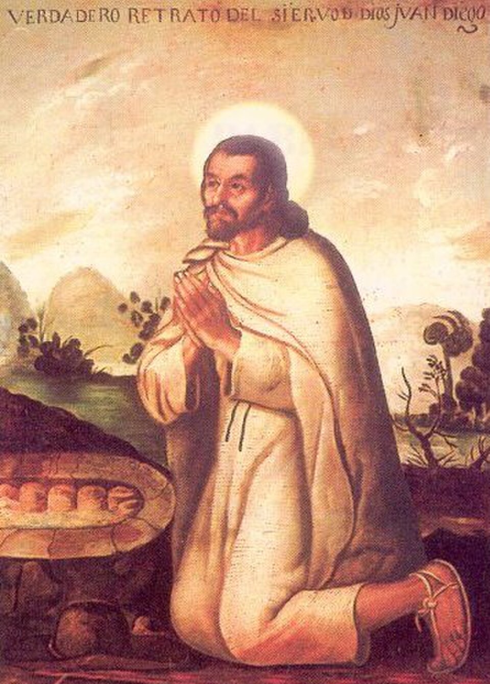 Pintura de san Juan Diego arrodillado con tilma blanca y aureola, las manos juntas en oración ante un paisaje