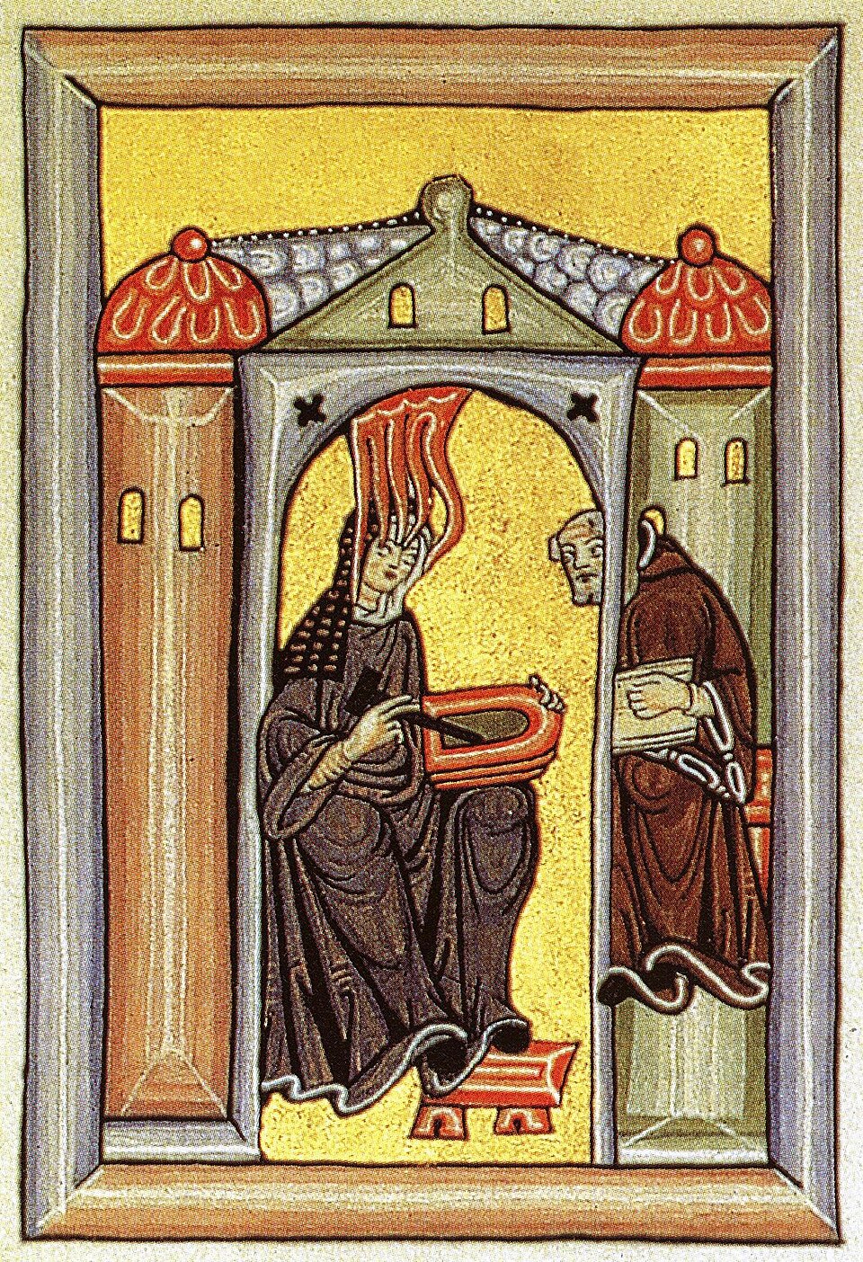 Miniatura medieval de santa Hildegarda de Bingen escribiendo en una tablilla, con llamas sobre la cabeza y un monje
